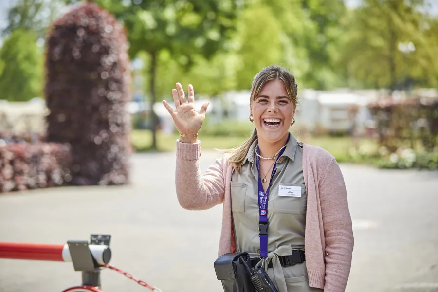Aline zwaaien verwelkomen LR